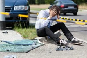 Frustrated man getting worried of the car accident.