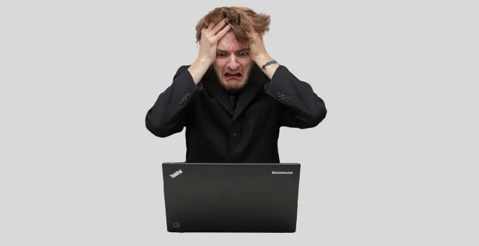 Frustrated man viewing strange Excel paste results